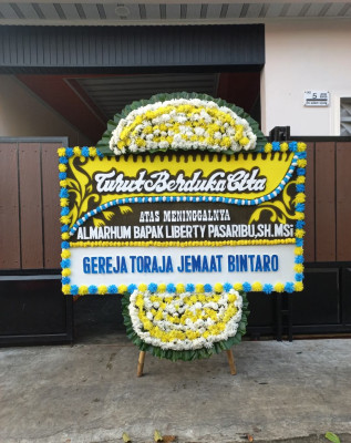 Papan Bunga Duka di Pelang Kenidai